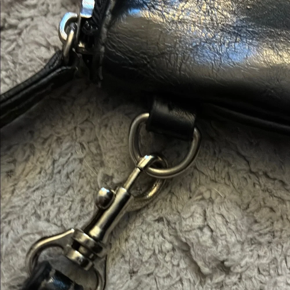 Elegant Black Clutch Wristlet with Silver Accents